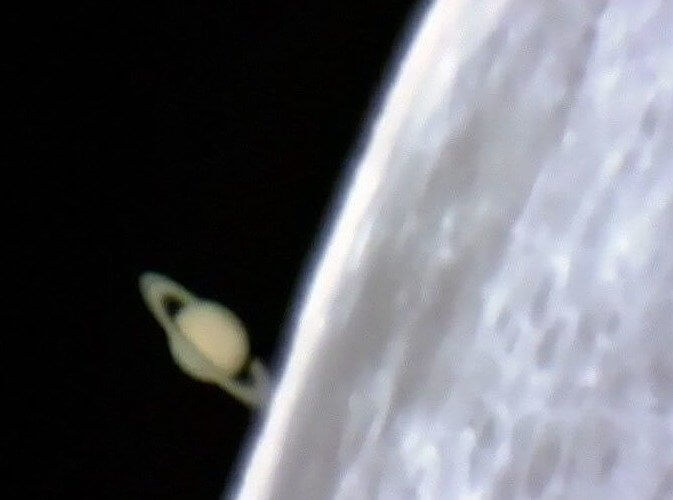 Saturn Photobombs Moon!