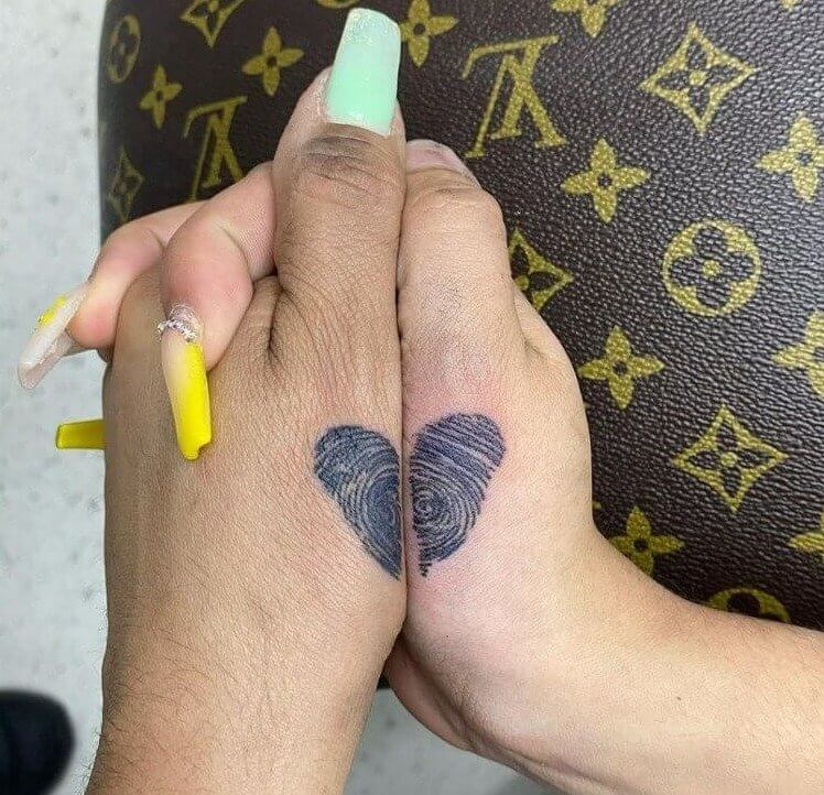 Fingerprint Tattoos That Come Together to Make a Heart