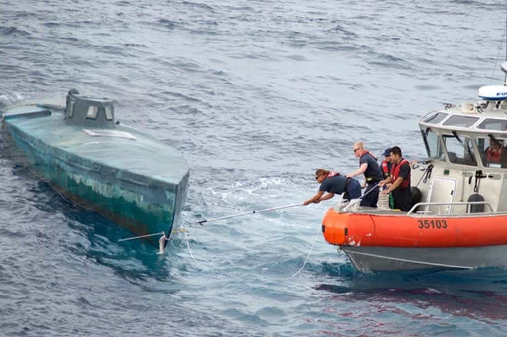 Coast Guard Intercepts Strange Blue Boat, Then They Look Inside